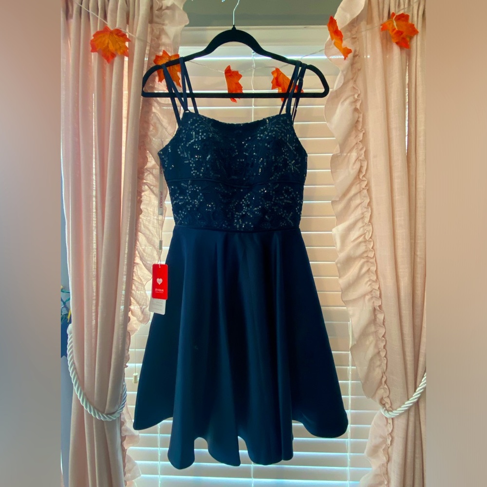JJ’s House homecoming dress, size 4, color is dark navy.